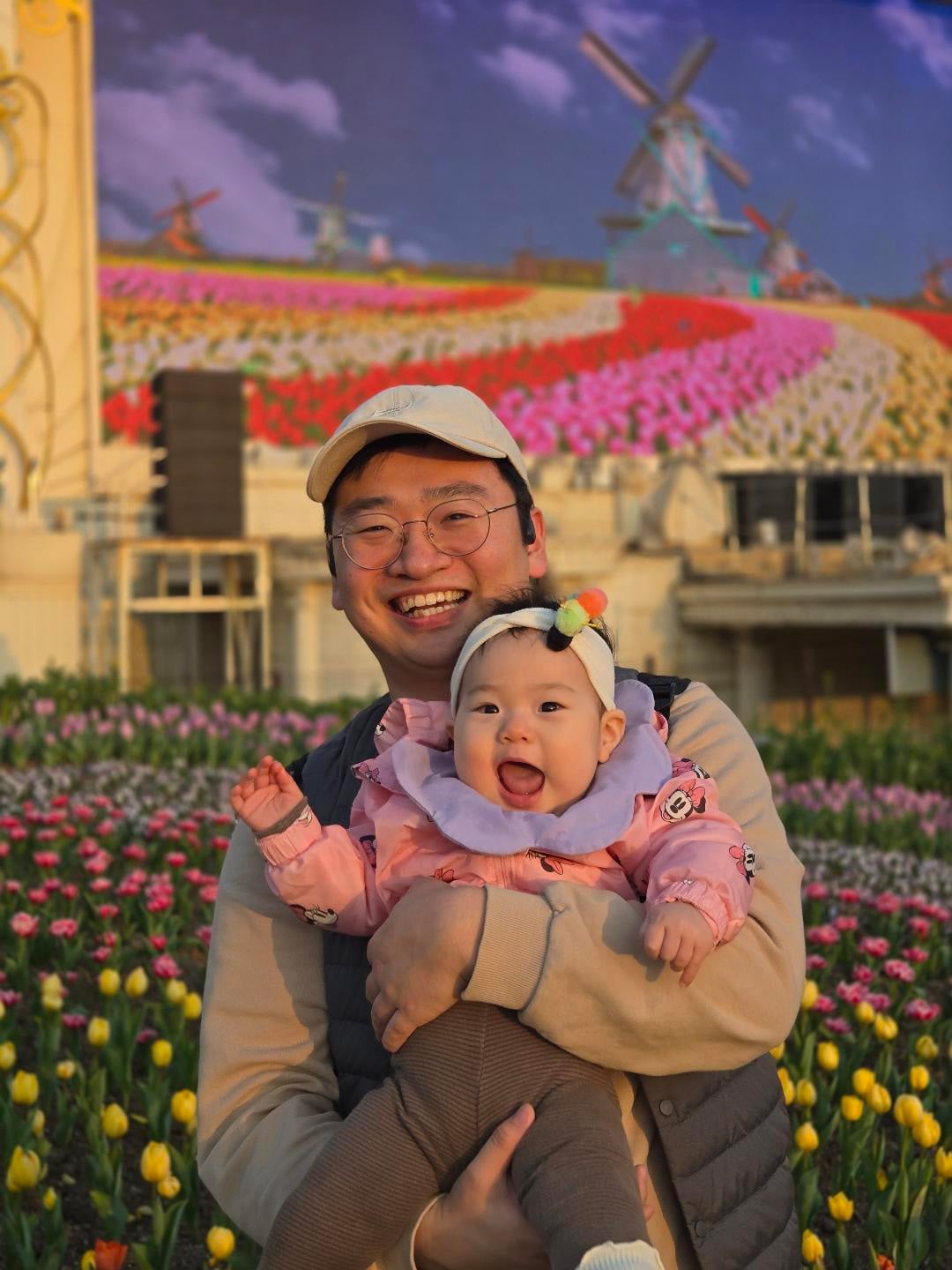 Darren Jeon, Engineer, Mycronic, seen holding his infant daughterdaughter